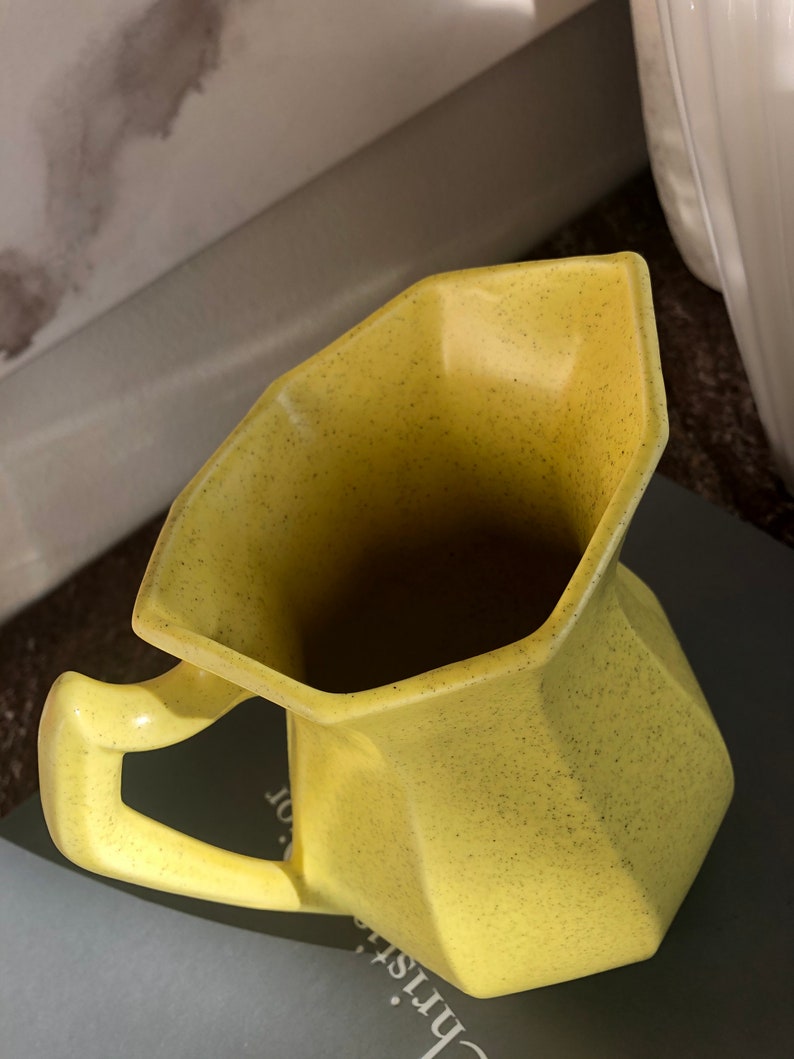 Vintage hand made bright yellow speckled California Pottery pitcher made in the USA