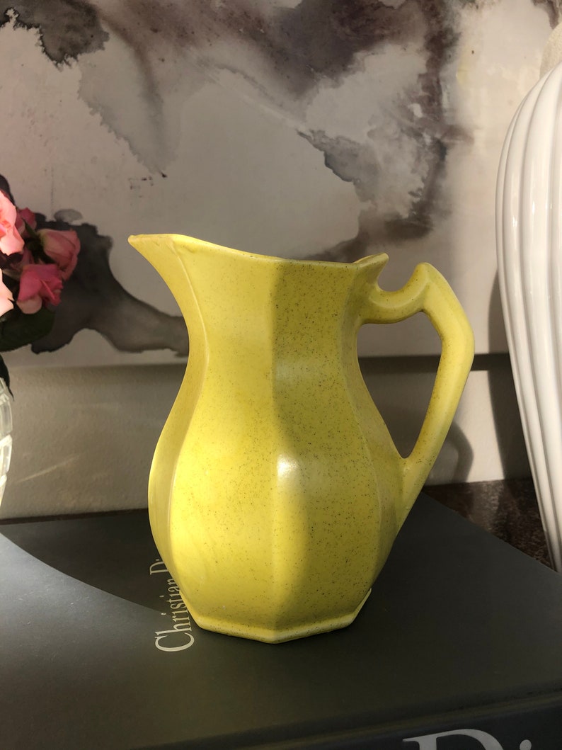Vintage hand made bright yellow speckled California Pottery pitcher made in the USA