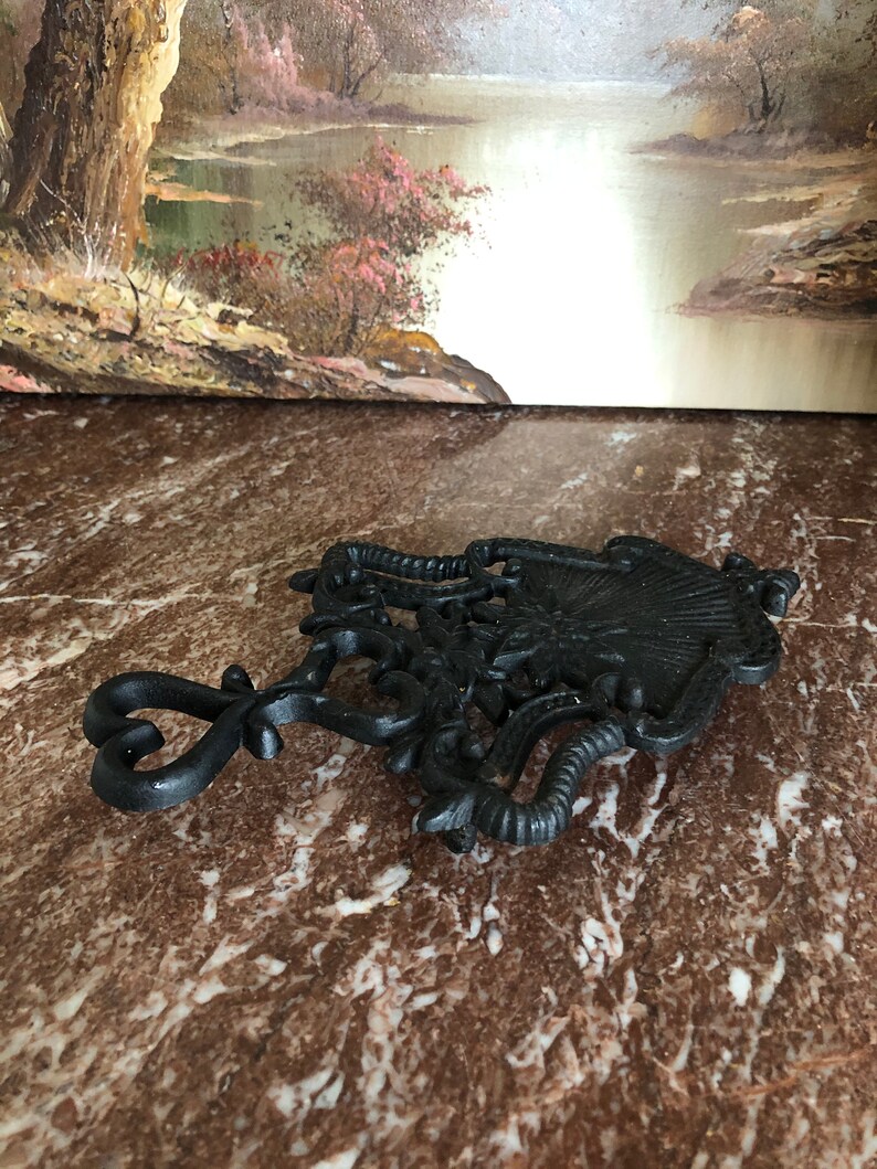 Vintage heavy wrought iron trivet hearts design