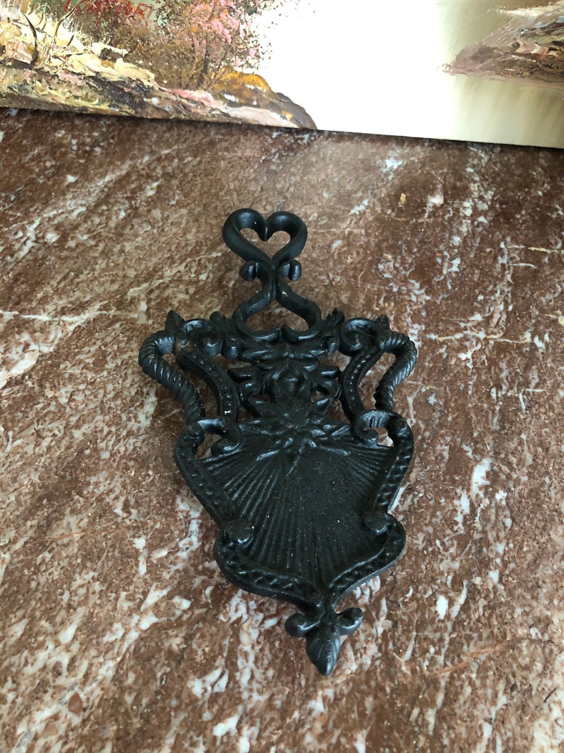 Vintage heavy wrought iron trivet hearts design