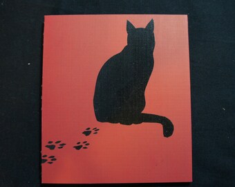 Cat walking to front blank book