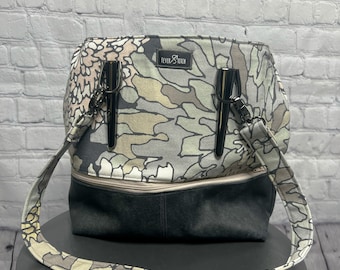 Handmade leather and canvas shoulder bag featuring icicle strap connectors