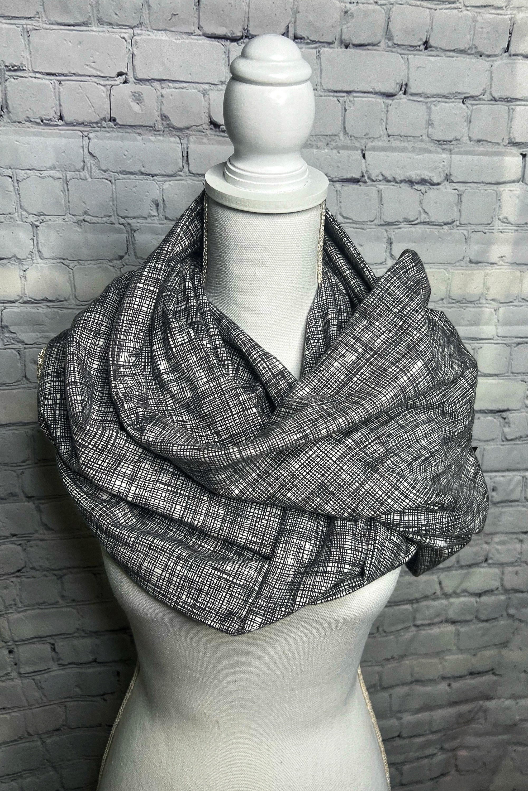 Flannel infinity scarf with hidden zipper pocket