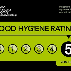 May include: A green and black food hygiene rating sign with a white circle containing the number 5 and the text "VERY GOOD".