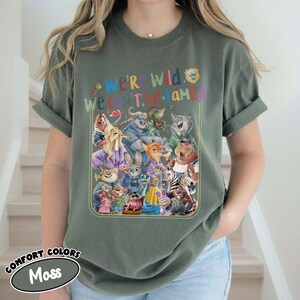 May include: A set of three ceramic mugs with a speckled, matte finish. Each mug features a different color: light blue, cream, and gray. The mugs have a simple, modern design with a rounded shape and a comfortable handle.