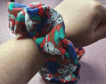 Red and blue skulls and roses scrunchie