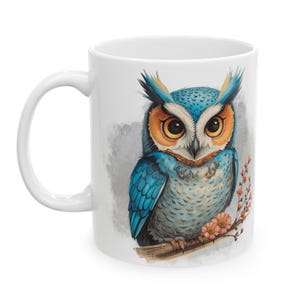 May include: A set of three ceramic mugs with a speckled, matte finish. The mugs are in shades of cream, light gray, and dark gray. Each mug has a simple, minimalist design, perfect for coffee or tea.