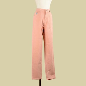 May include: A pair of light pink pants with a straight leg fit.