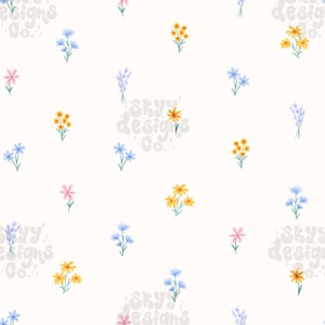 Può includere: Un motivo ripetuto di fiori ad acquerello in vari colori, tra cui giallo, blu, rosa e viola, su uno sfondo color crema. I fiori sono piccoli e sparsi sulla superficie. È presente anche il testo "Skyy designs Co.".