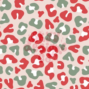 May include: A seamless pattern featuring abstract shapes in red, green, and white against a light pink background. The design resembles a leopard print, with rounded shapes scattered across the surface. The pattern is suitable for various applications.