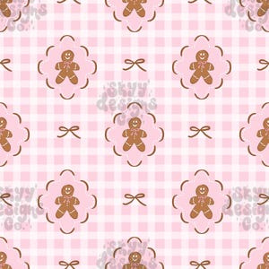 Könnte beinhalten: Ein sich wiederholendes Muster mit braunen Lebkuchenmännchen mit rosa Zuckergussdetails, die jeweils in einem gewellten rosa Rahmen zentriert sind. Der Hintergrund besteht aus einem hellrosa-weißen Vichy-Karo, durchsetzt mit kleinen braunen Schleifen.
