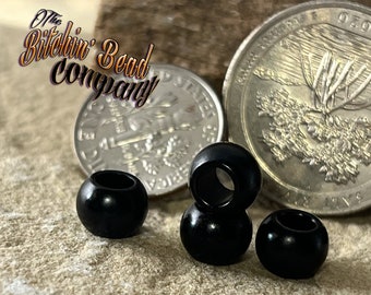 Black, Anodized Aluminum Bead.  4mm hole, 5.5mm height, 7.5mm width at widest circumference