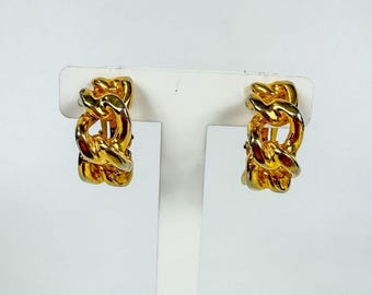 Pendientes de clip vintage de YSL Yves Saint Laurent con cadena dorada, años 80.