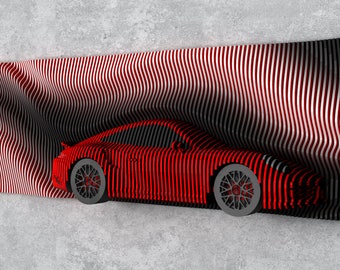 May include: A red sports car sculpture with grey wheels against a wavy, striped red and black background. The artwork is mounted on a grey concrete wall, creating a modern, artistic display.