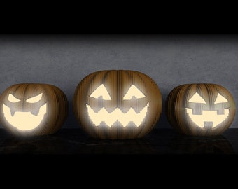 May include: Three wooden jack-o'-lantern pumpkins with glowing faces. The pumpkins are carved with traditional Halloween features, including eyes, a nose, and a wide, toothy grin.