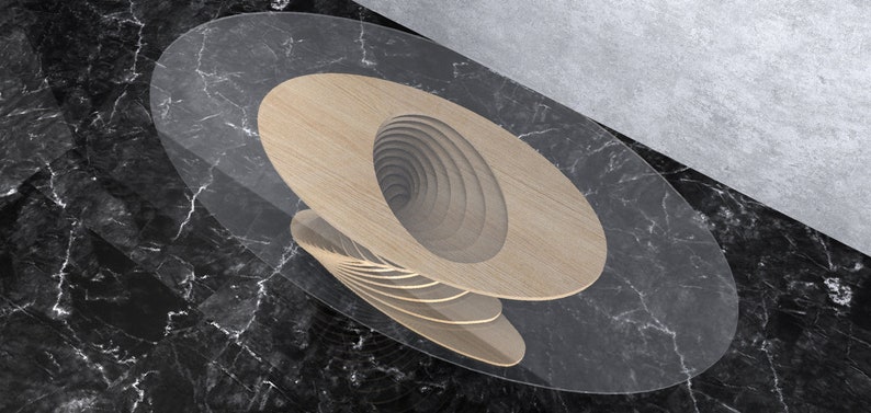 May include: A wooden coffee table with a unique spiral design. The table top is oval shaped and has a clear glass top. The table is on a black marble surface.