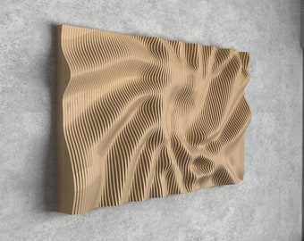 May include: A wall-mounted, abstract wood sculpture with a wavy, flowing design. The sculpture is made of thin, vertical strips of wood that are arranged in a pattern that creates a sense of movement. The sculpture is painted in a light brown color.