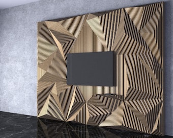 Może przedstawiać: Nowoczesny, geometryczny panel ścienny wykonany z drewnianych listew. Panel charakteryzuje się fakturowanym, abstrakcyjnym wzorem z prostokątnym wycięciem na telewizor. Panel jest jasnobrązowy i zamontowany na szarej ścianie.