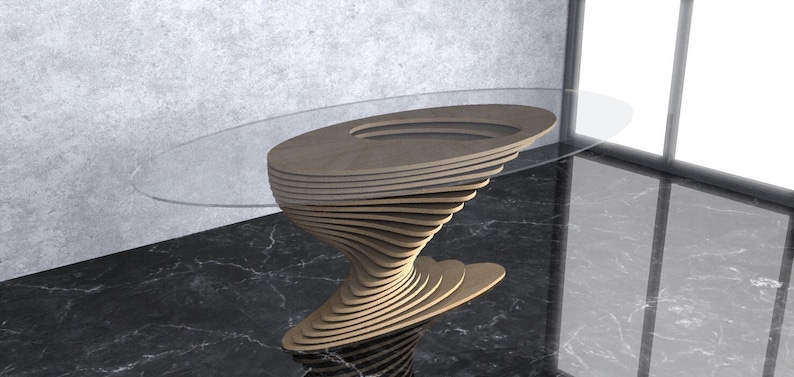 May include: A modern, oval-shaped glass-top coffee table with a unique, swirling wooden base. The base is made of multiple layers of wood, creating a dynamic and eye-catching design.
