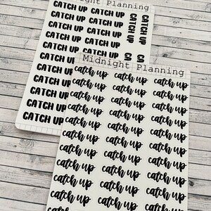 May include: A sheet of clear stickers with the phrase "Catch Up" repeated in black cursive lettering. The stickers are arranged in rows and columns on a white background. The text "Midnight Planning" appears at the top of the sheet.