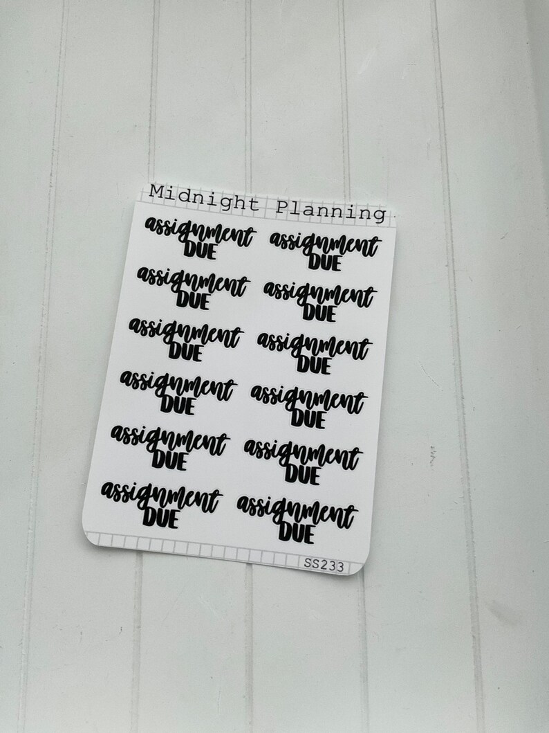 May include: A sheet of stickers with the text "Midnight Planning" at the top. The stickers are black and white and say "assignment due" in a handwritten font.