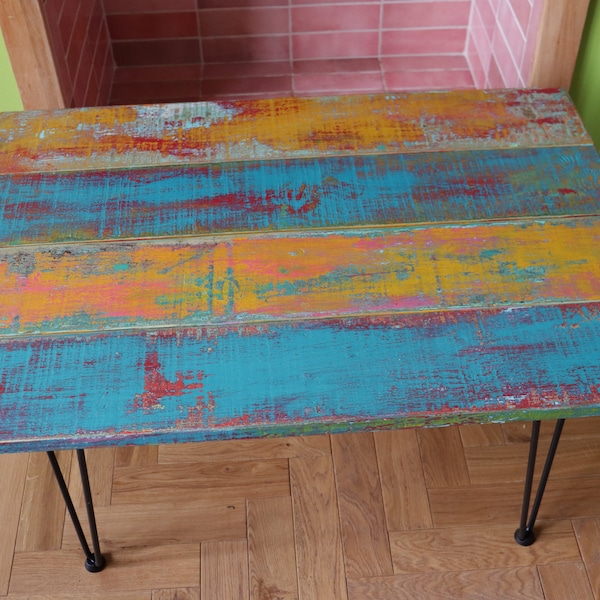 Colourful coffee table made from recycled pallets