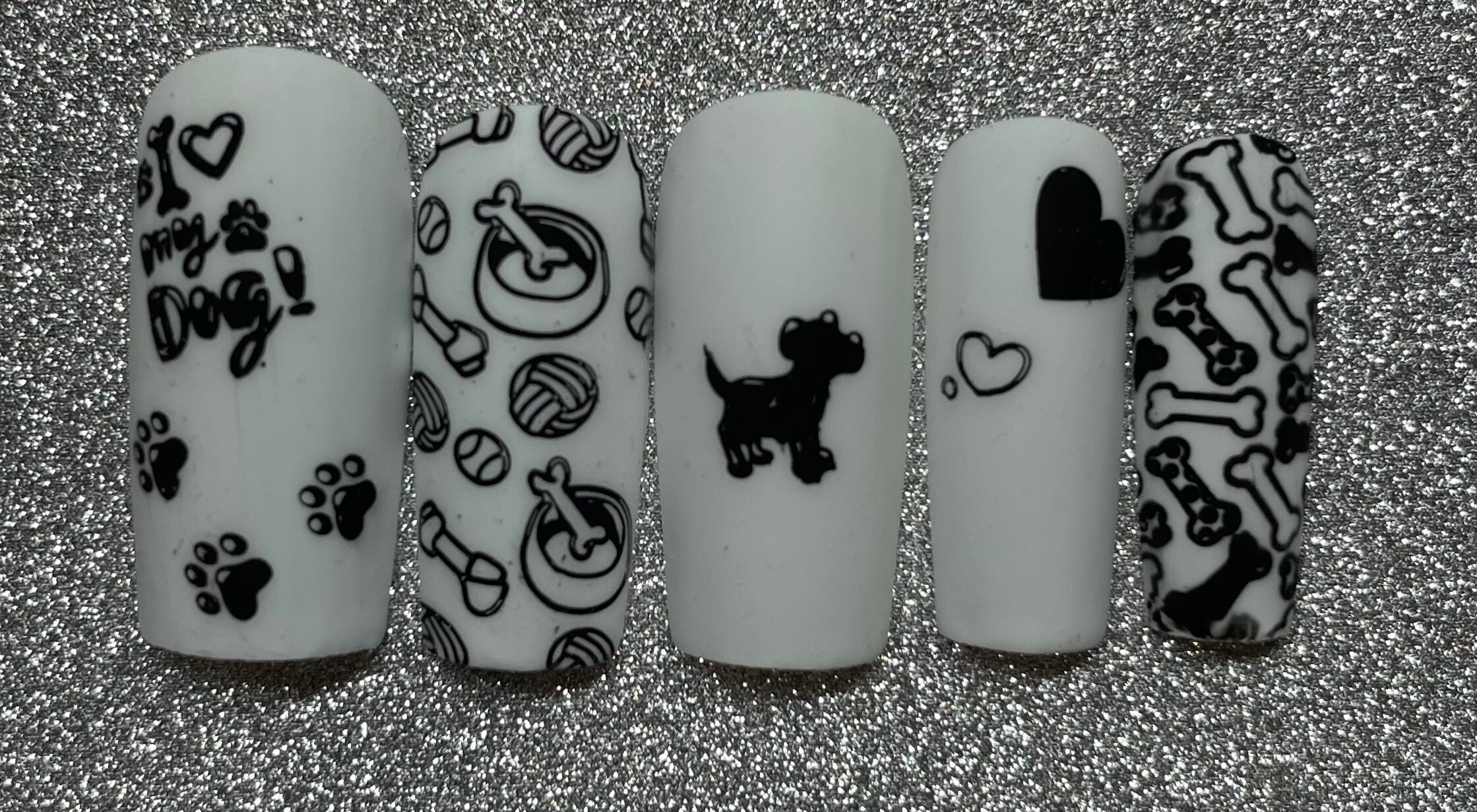 Why Are Some Of My Dogs Nails White And Some Black