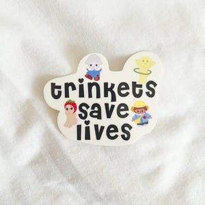 trinkets save lives sticker