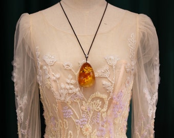 Unique Artisan butterscotch amber carved cat face pendant black chord necklace