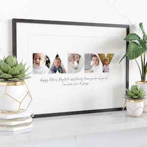 May include: A black framed print featuring the word "DADDY" with baby photos within the letters. The white background has the text "Happy Father's Day to the best Daddy, thank you for all you do. Love from Lovie & George."