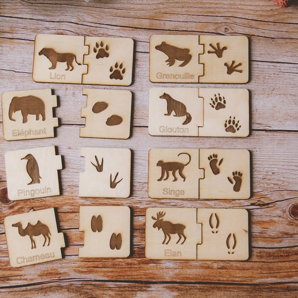 Puzzle en bois éducatif pour enfant pour apprendre les empreintes d'animaux