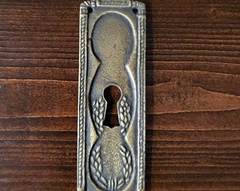 Antique Vintage Art Deco Art Nouveau style escutcheon vertical keyhole cover