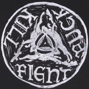 May include: Black and white circular design featuring the text "Black Sabbath" and "Alient" in a gothic font. The design includes a triangle with three eyes and a creature with three heads.