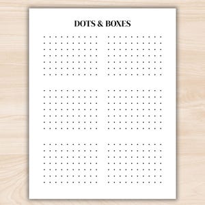 May include: A white sheet of paper with the title "DOTS & BOXES" at the top. The paper is divided into four sections, each filled with a grid of evenly spaced black dots. The design is simple and suitable for a game or activity.