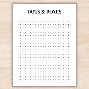 May include: A white sheet of paper with the text "DOTS & BOXES" in a bold, black font at the top. The page is filled with a grid of evenly spaced black dots, perfect for a game or activity.