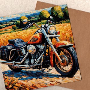 May include: An impressionistic painting of an orange motorcycle parked on a cobblestone path. The background features a vibrant golden wheat field under a blue sky with rolling green hills. The motorcycle has chrome details and a black seat.
