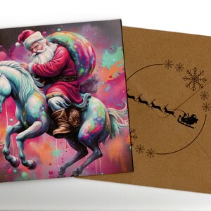 Carte de Noël faite main avec le Père Noël sur une licorne 15 x 15 cm vierge à l'intérieur