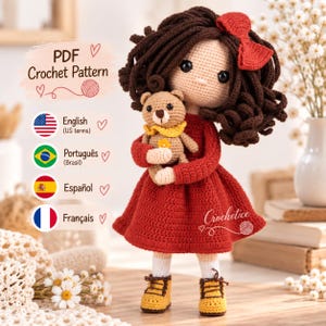 May include: A crochet doll with dark brown curly hair, a red bow, and a red dress, holding a small tan teddy bear with a yellow collar. The doll wears white socks and yellow shoes. Text includes PDF Crochet Pattern, English, Português, Español, Français.