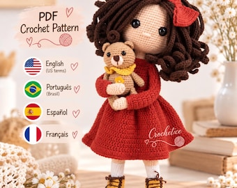 May include: A crochet doll with dark brown curly hair, a red bow, and a red dress, holding a small tan teddy bear. The doll wears white socks and yellow shoes. Text on the image reads PDF Crochet Pattern, English, Português, Español, Français, and Crochetice.