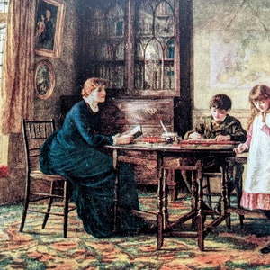 May include: A woman sits at a table with two children, reading a book. The children are seated at the table, one writing and the other looking on. The room is decorated with a rug, a bookcase, and a window with a view of a garden.