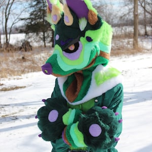 May include: A set of three ceramic mugs with a speckled, matte finish. The mugs are in shades of cream, light gray, and dark gray. Each mug has a simple, minimalist design and a rounded handle. Perfect for coffee or tea.