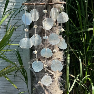 Wind chime made of shell garlands. Total length approx. 80 cm.