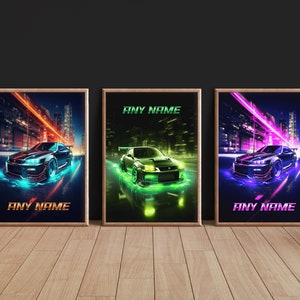 May include: Three framed prints of a black car with neon lights in a city setting. The car is in the centre of each print and is surrounded by a blurred city background. The prints have a black frame and a white background. The text "ANY NAME" is at the bottom of each print.