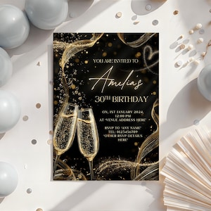 May include: A black and gold birthday invitation with the text "Amelia's 30th Birthday". The invitation features two champagne flutes, gold swirls, and the event details. The invitation is surrounded by white and gold decorations.