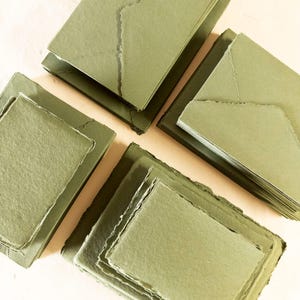 Close-up of Olive Green Deckle Edge Paper showing the textured edges and high-quality cotton rag materia