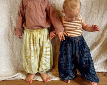 Pantalones hippies bohemios para niños, aptos para pañales de tela, holgados, con cintura elástica y cómodos pantalones harén para recién nacidos, niños pequeños y jóvenes, estilo bohemio.