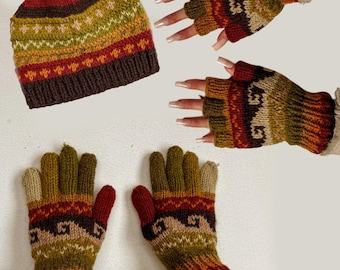 May include: A knitted hat with a pom-pom and matching gloves. The hat and gloves feature a pattern of brown, red, green, and tan stripes and geometric shapes. The gloves are fingerless.