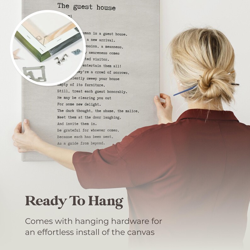 a woman writing on a piece of paper with the words ready to hang