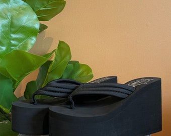 black platform flip flops