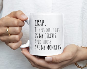 May include: White ceramic mug with black text that reads "CRAP. TURNS OUT THIS IS MY CIRCUS AND THOSE ARE MY MONKEYS".